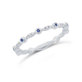 0.03ct Diamond and 0.03ct Blue Sapphire 14k White Gold Lady's Band
